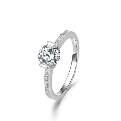 Solitaire ring with zircons on the arm