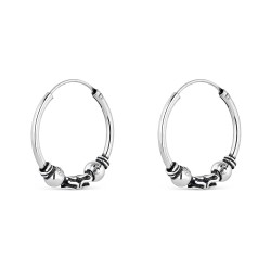 Silver 20 mm Balinese hoop earring with central oxidized...