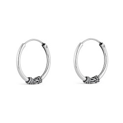 Silver 20 mm Balinese hoop earring with central oxidized...