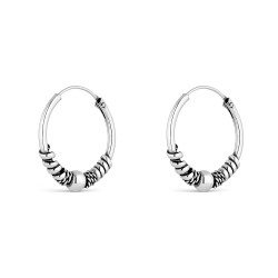 Silver 18 mm Balinese hoop earring with central oxidized...
