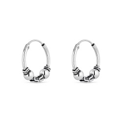 Silver 16 mm Balinese hoop earring with central oxidized...